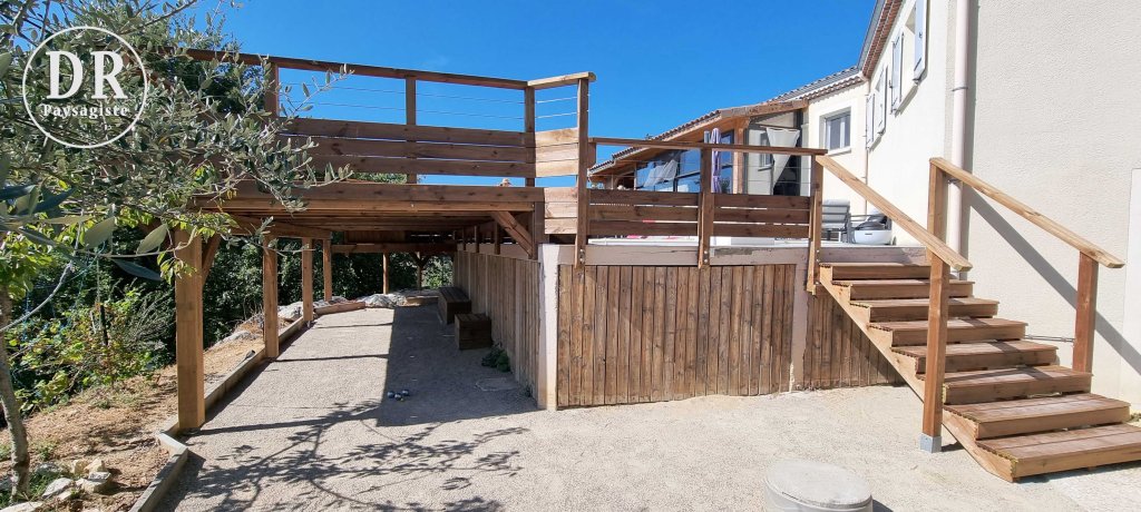 Terrain petanque terrasse abri bois David Robert paysagiste