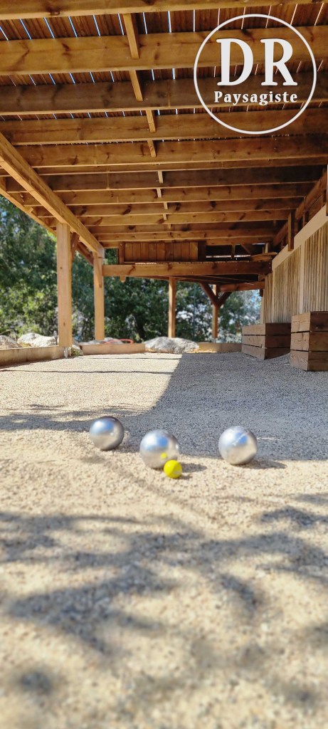 Terrain petanque terrasse abri bois David Robert paysagiste