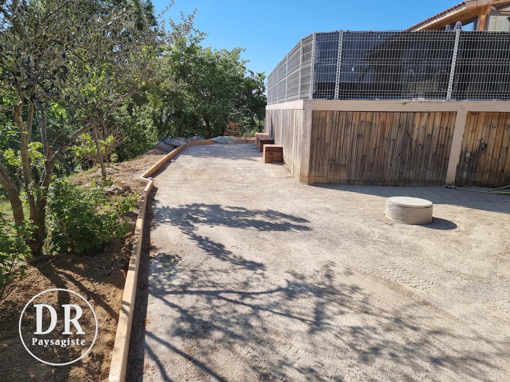 Terrain petanque terrasse abri bois David Robert paysagiste